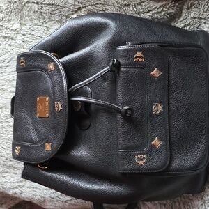 MCM Black and Gold Leather Backpack
